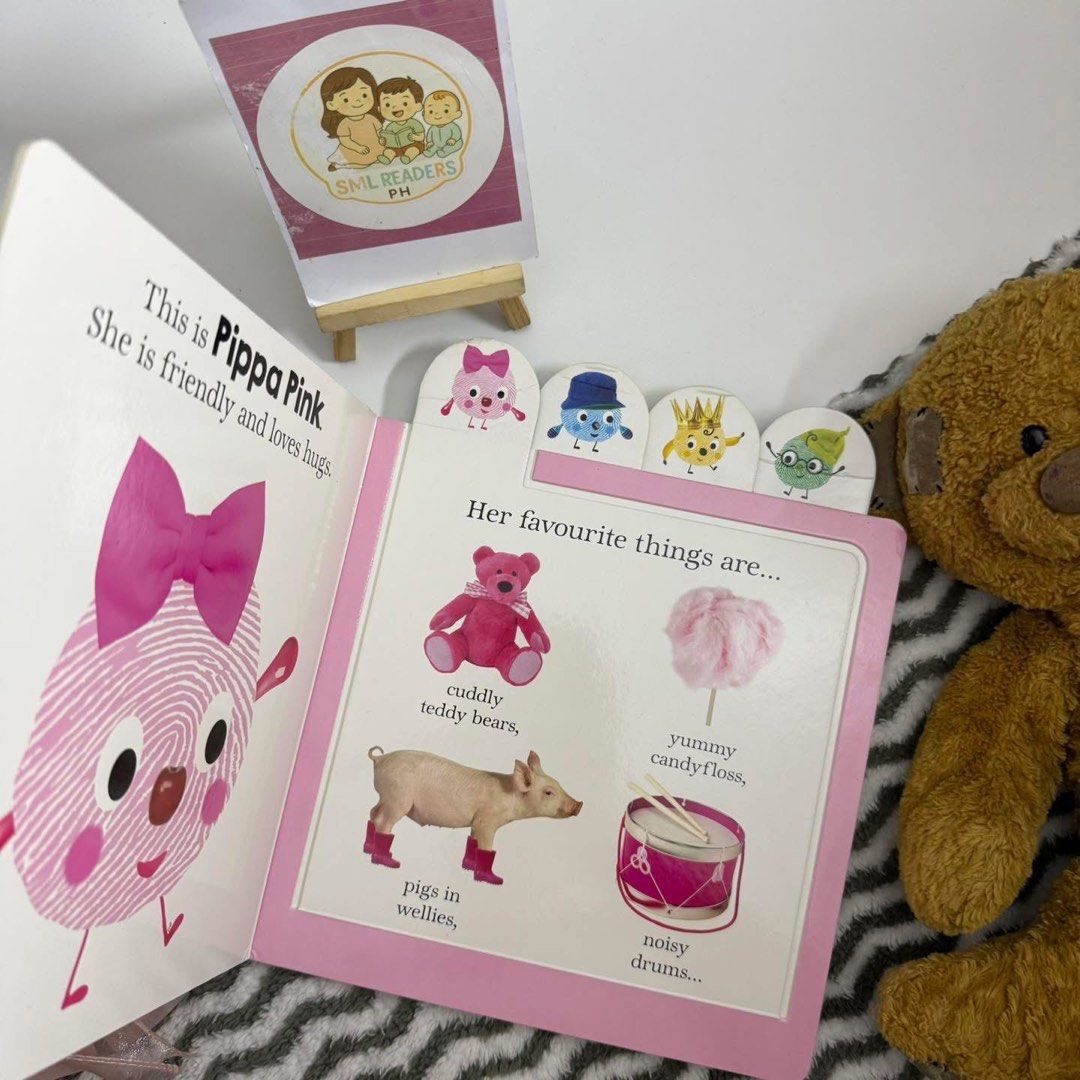 Priddy Alphaprints Alphababies (Category: Children's Books) located in Taguig. Submitted by smlreadersph (Listing ID 1461736380, Image 2). Description: 💗 𝐀𝐥𝐩𝐡𝐚𝐩𝐫𝐢𝐧𝐭𝐬 — 𝐀𝐥𝐩𝐡𝐚𝐛𝐚𝐛𝐢𝐞𝐬 👶🌈 Lift-the-Flap Board Book 💬 Comment “Mine/M + Alphababies” 🏷️ ₱250 📖 Condition: Preloved lift-the-flap board book with visible signs of use, including creases on the tabs due to shipping, shelf wear, and a corner bump at the lower spine. 👧