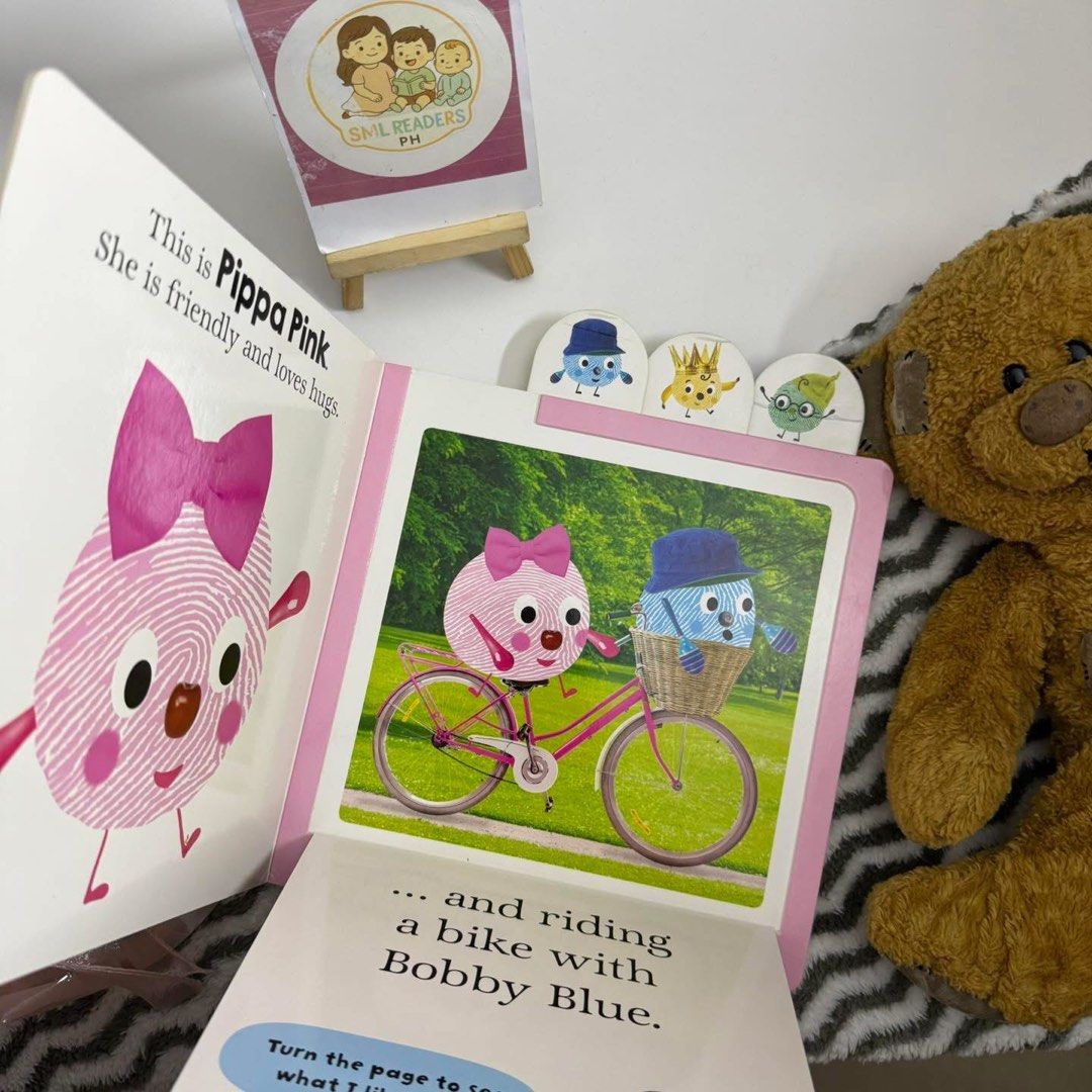 Priddy Alphaprints Alphababies (Category: Children's Books) located in Taguig. Submitted by smlreadersph (Listing ID 1461736380, Image 3). Description: 💗 𝐀𝐥𝐩𝐡𝐚𝐩𝐫𝐢𝐧𝐭𝐬 — 𝐀𝐥𝐩𝐡𝐚𝐛𝐚𝐛𝐢𝐞𝐬 👶🌈 Lift-the-Flap Board Book 💬 Comment “Mine/M + Alphababies” 🏷️ ₱250 📖 Condition: Preloved lift-the-flap board book with visible signs of use, including creases on the tabs due to shipping, shelf wear, and a corner bump at the lower spine. 👧