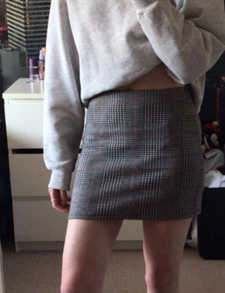 Pull & Bear Plaid Mini Skirt Size S (Category: Skirts) located in Taguig. Submitted by thriftzzzy (Listing ID 1461675751, Image 3). Description: - Cute plaid mini skirt from Pull & Bear - Classic black, white, and red pattern - Comfortable stretchy waistband - Versatile: dress up or down - Perfect for casual outings or nights out.