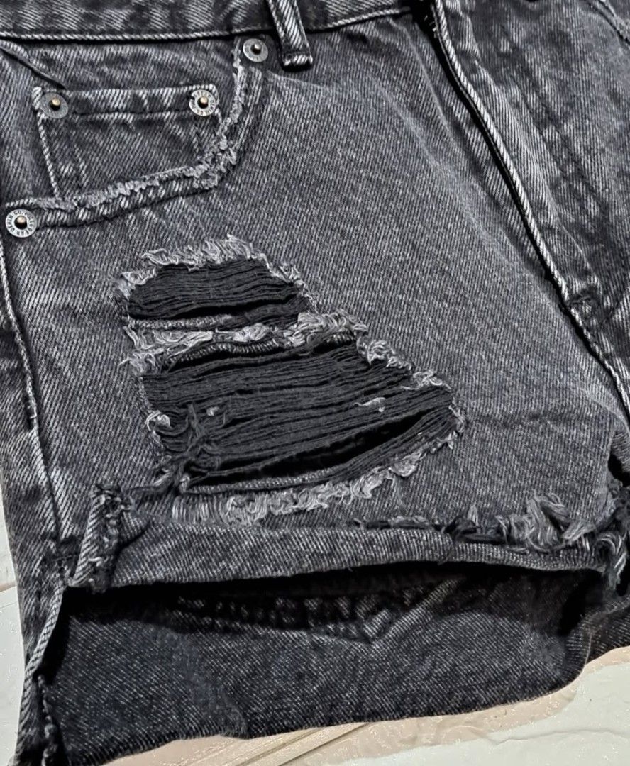 Pull & Bear Rippes Black Denim (Category: Shorts) located in Taguig. Submitted by authprelovedonlineshop2 (Listing ID 1461693797, Image 3). Description: Pull & Bear Rippes Black Denim Excellent Condition High Waist Eur34( Waist 24 inches) L27cm Php288 🍀All items are preloved unless stated as brand new. 🍀Please manage your expectations. Major flaws will be indicated, if any. 🍀Color may vary due to lightning and photography. 🍀Always read the ca