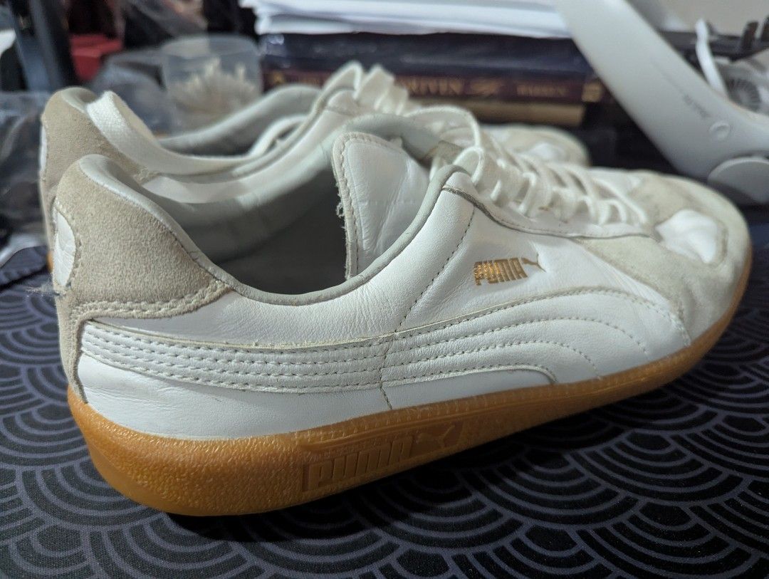 Puma (Category: Casual Shoes) located in Quezon City. Submitted by freuddd (Listing ID 1461719299, Image 3). Description: - Brand: Puma - Size: EU 42 / UK 8 / US 9 - Color: White with light grey suede accents - Material: Leather and suede upper, gum sole - Condition: Good pre-loved condition - Style: Classic, retro sneakers - Meetup locations: SM City San Mateo, SM City Marikina, Ayala Malls Feliz.