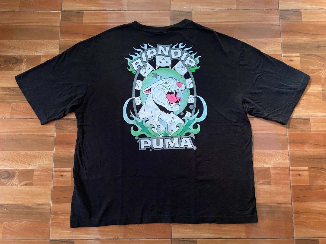 PUMA / RIP N DIP SHIRT (Category: Tshirts & Polo Shirts ) located in Nabua. Submitted by supermix5119 (Listing ID 1461672528, Image 2). Description: Puma / Rip N Dip Xl Length:29 Width:24.4 Excellent Condition 550+Sf.