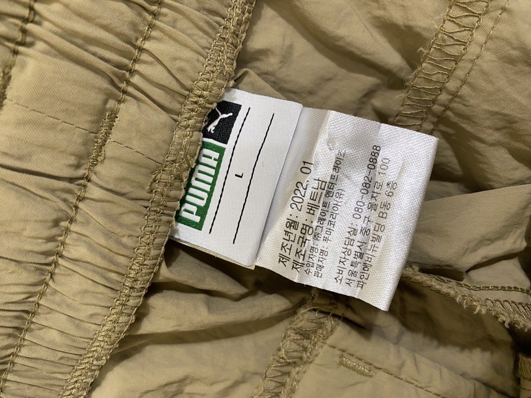 Puma Beige Cargo Shorts Size L (Category: Shorts) located in Cebu City. Submitted by theloose.thread (Listing ID 1461781217, Image 3). Description: - Brand: Puma - Color: Beige - Size: L - Features: Drawstring waist, multiple pockets - Origin: Made in Vietnam - Ideal for: Casual wear, sports activities.