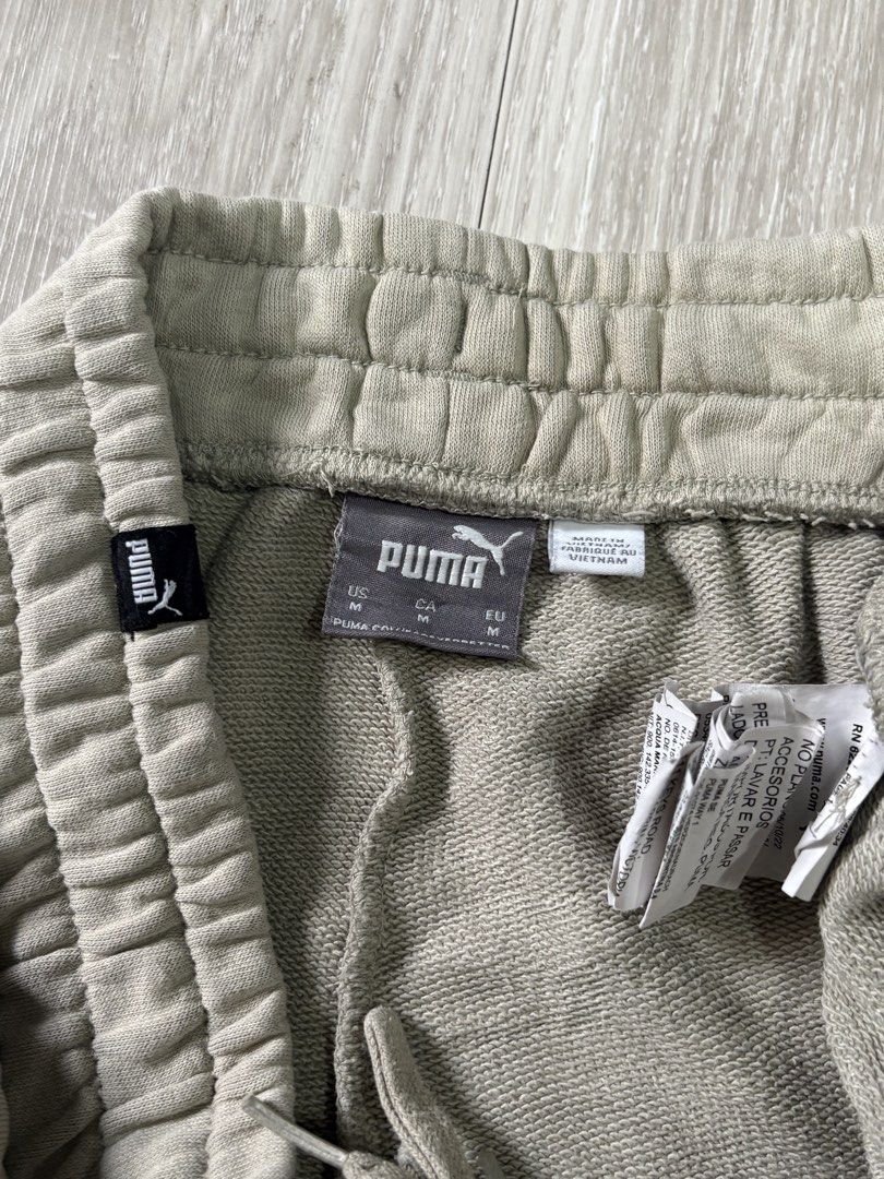 Puma Beige Sweat Shorts Size M (Category: Shorts) located in Rizal. Submitted by thriftdrip.402 (Listing ID 1461703097, Image 3). Description: - Beige Puma Sweat Shorts - Size: Medium - Elastic waistband with adjustable drawstring - Classic embroidered Puma logo on left leg - Ideal for casual outings or lounging at home.