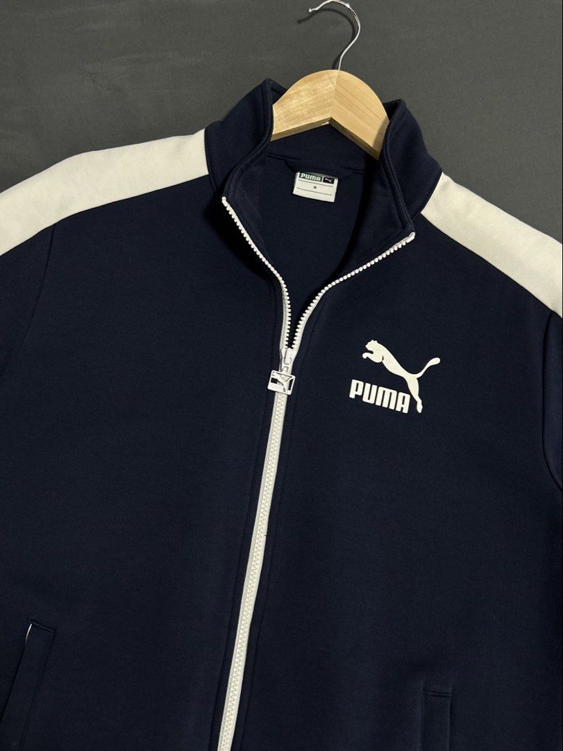 Puma T7 Track Jacket Navy Blue (Category: Coats, Jackets and Outerwear) located in Cavite. Submitted by gnthrift (Listing ID 1461577810, Image 2). Description: Puma Track Jacket ‘Navy Blue’ Size: M on tag Dimes: 21x27.5 Color rate: 9.5/10 Complete tags Excellent condition Issue: minimal stain sa white part Mine 500 + SF Location: Indang, Cavite MOP Gcash Courier: J&T Express.