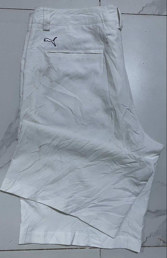 Puma White Golf Shorts ⛳️🏌️‍♂️ (Category: Shorts) located in General Santos City (Dadiangas). Submitted by angelahlim122001 (Listing ID 1461673447, Image 1). Description: - White Puma golf shorts Waist 36 Length 21 Hips 21 Thigh 14 Leg Hole 11.5 - Closure: Button and zip - Pockets: Two front, two back - Branding: Subtle Puma logo on left leg and back - Features: Inner lining with fun pattern - Ideal for: Golf course or casual wear.