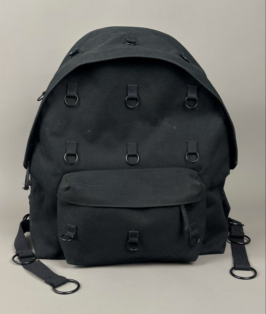 Raf Simons - EASTPAK F/W19 Padded Loop Canvas Backpack - Black. (Category: Backpacks) located in Manila. Submitted by scissor.2fifthy (Listing ID 1461744259, Image 1). Description: Raf Simons - EASTPAK F/W19 Padded Loop Canvas Backpack - Black. Size: OS Material: 100% Cotton 90/100 condition rate 9/10 Color rate Gently used Flaw: Minor dirt only Very presentable Dimensions Height 17 Inches Width 13 Inches Depth 6 Inches Accepting offers. .