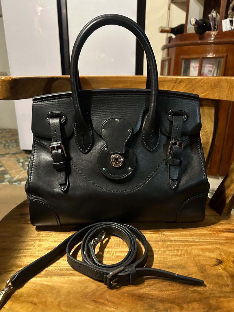 RALPH LAUREN RICKY 27 ( Rare Size) (Category: Luxury Bags & Wallets) located in Caloocan City. Submitted by thon0806 (Listing ID 1461796586, Image 1). Description: - Authentic Ralph Lauren Ricky 27 handbag - Color: Classic Black - Size: 27 (Rare size) - Material: Genuine Leather - Features: Top handles, adjustable/detachable shoulder strap, signature Ricky lock closure - Condition: Pre-loved, well-maintained - Style: Elegant and timeless, perfect