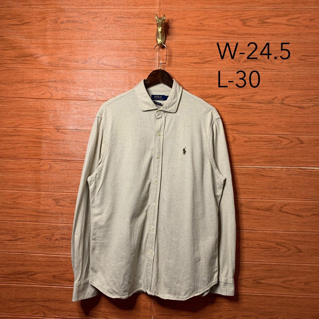 Ralph Lauren RL Beige Button down (Category: Formal Shirts) located in Quezon City. Submitted by donklasiko (Listing ID 1461576765, Image 2). Description: Condition: 9.5+/10 Pristine condition Issue: non Refer to the dimension 🤗 PM FOR MORE DETAILS NO RETURN, NO EXCHANGE & NO REFUND! ✅I ALSO ACCEPT TRADE/SWAP TO ANYTHING JUST DROP YOUR OFFER Please manage your expectations, this is a secondhand item. What you see is what you get 😊 💵MOP: GCASH,