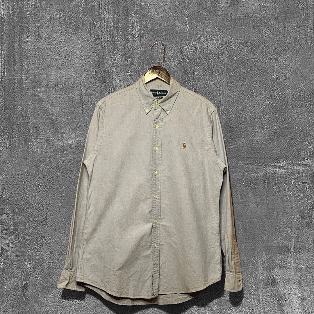 Ralph Lauren RL Button down (Category: Formal Shirts) located in Quezon City. Submitted by donklasiko (Listing ID 1461577219, Image 1). Description: Condition: 9.5+/10 Pristine condition Issue: non Refer to the dimension 🤗 PM FOR MORE DETAILS NO RETURN, NO EXCHANGE & NO REFUND! ✅I ALSO ACCEPT TRADE/SWAP TO ANYTHING JUST DROP YOUR OFFER Please manage your expectations, this is a secondhand item. What you see is what you get 😊 💵MOP: GCASH, BDO o