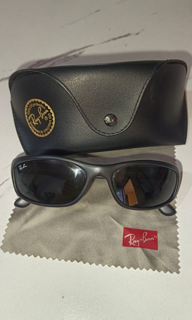 Ray-Ban Small Predator Active Lifestyle Sunglasses (Category: Sunglasses & Eyewear) located in Manila. Submitted by lovemariii (Listing ID 1461653136, Image 1). Description: Authentic Ray-Ban sunglasses made in Italy. *Not a copy, replica, or counterfeit Size: Lens Width-57mm Bridge-16mm Temple Length-135mm Gender: Men's Style: Active Lifestyle Wrap Made in Italy Ray-Ban Small Predator Active Lifestyle Sport Wrap Sunglasses. Comes with sunglasses