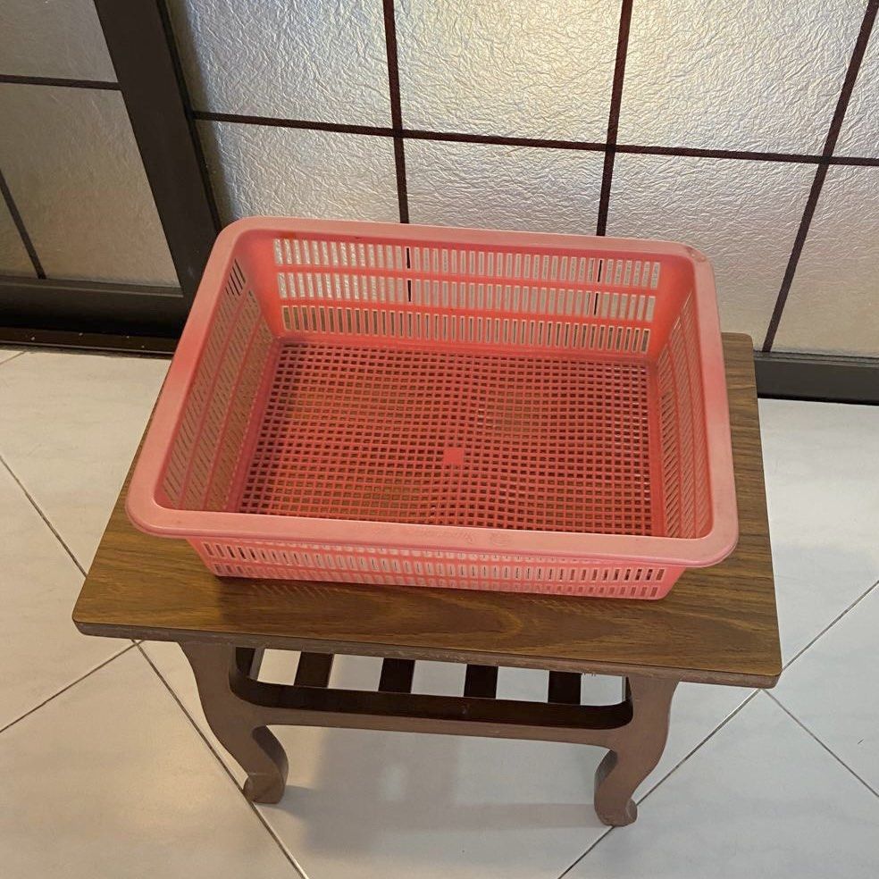 Rectangular Storage Basket Tray (Category: Storage Boxes & Baskets) located in Singapore. Submitted by ronghayley (Listing ID 1461621790, Image 1). Description: - Red plastic basket - Rectangular shape with grid pattern - Ventilation holes on sides - Ideal for organizing or drying items - Suitable for kitchen storage Measurements: Length 37cm Width 18cm Height 11cm Collect at Choa Chu Kang Check out my profile for more items.
