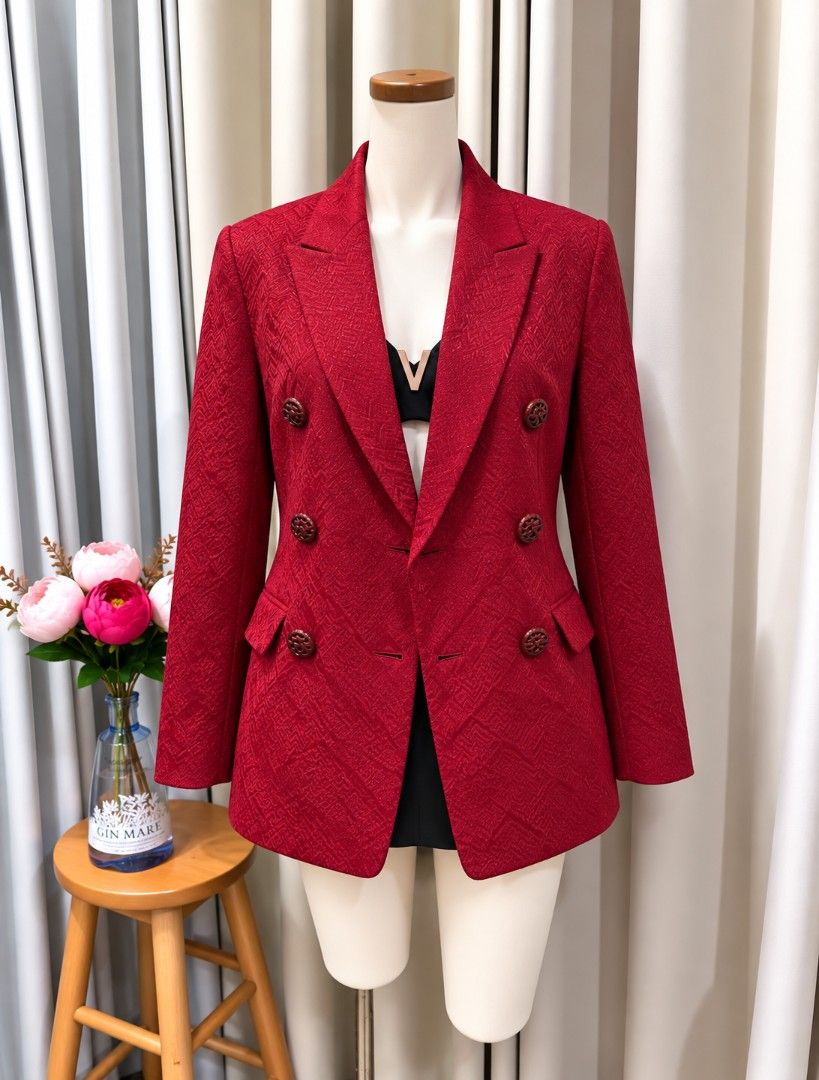 Red Double Breasted Blazer (Category: Coats, Jackets and Outerwear) located in Taguig. Submitted by vm.co (Listing ID 1461607313, Image 1). Description: Perfect for: • Corporate office wear • Business travel • Smart casual outfits • Rainy or cool weather • Capsule wardrobe • Everyday sophisticated styling Condition: Appears to be in very good preloved condition with no visible major stains, tears, or discoloration in the photo. A light steam will