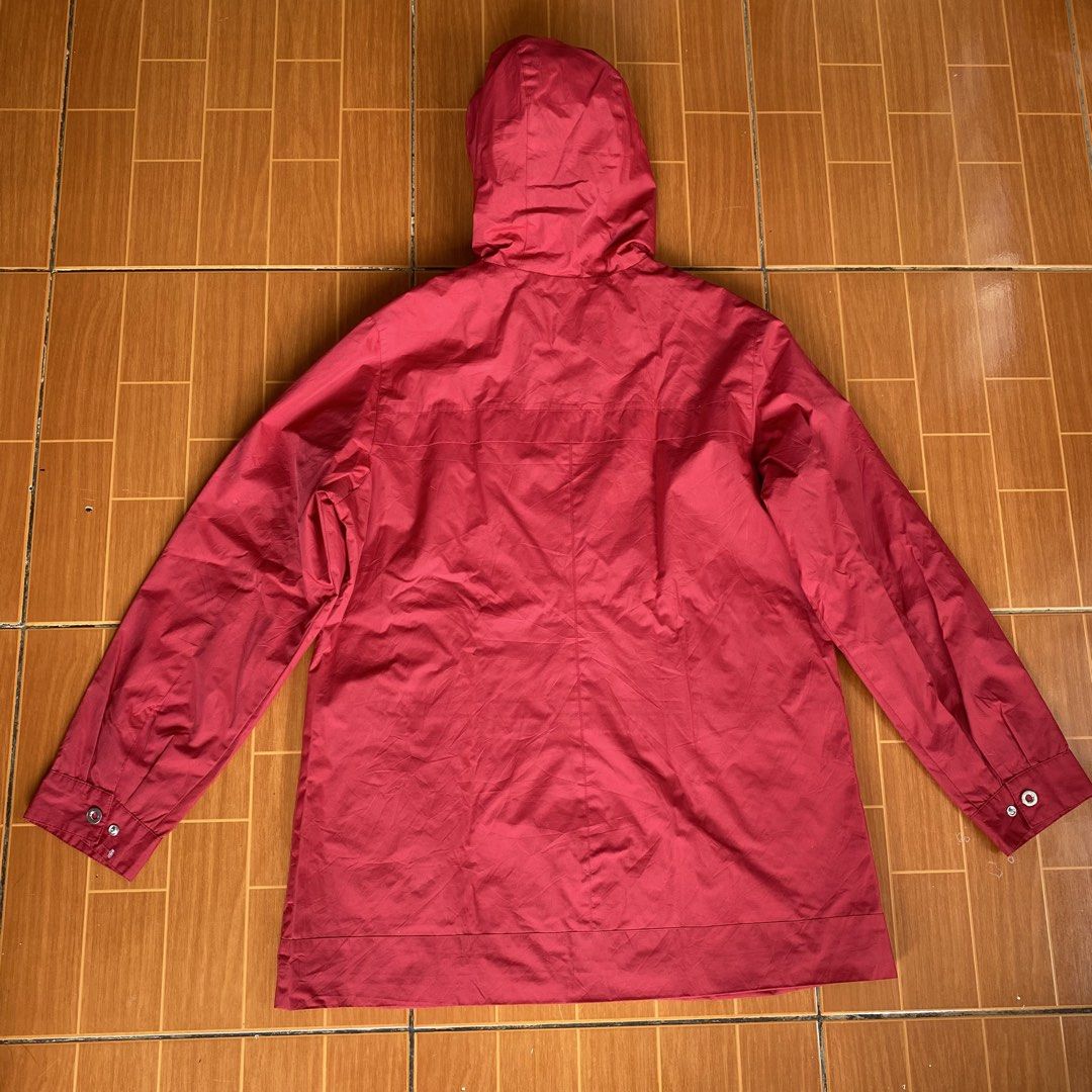 Red Hooded Jacket (Category: Coats, Jackets and Outerwear) located in Makati City. Submitted by eunaj (Listing ID 1461656596, Image 2). Description: - Red hooded jacket - Button-up front - Lined hood with subtle pattern - Long sleeves with button cuffs - Lightweight, ideal for windy or rainy weather - NEEDS WASHING‼️ - ISSUE: BROKEN ZIPPER.