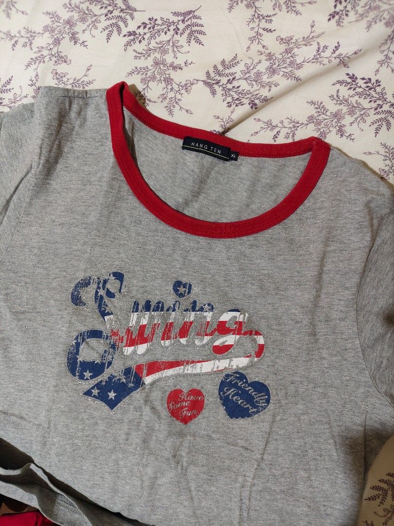 red ringer Y2K-style retro graphic shirt (Category: Shirts) located in Bulacan. Submitted by angel.decluttersx (Listing ID 1461731612, Image 2). Description: small to medium size cotton fabric material no issue.