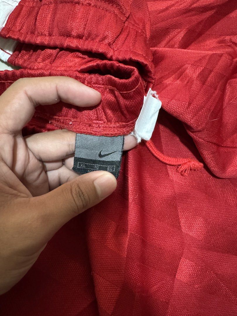 Red vintage Nike track pants (Category: Joggers) located in Malaybalay. Submitted by ozwehfinds (Listing ID 1461625294, Image 3). Description: Size 30 Length 40 Thigh 12.