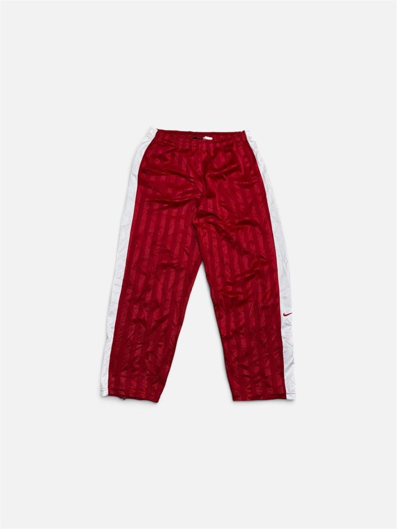 Red vintage Nike track pants (Category: Joggers) located in Malaybalay. Submitted by ozwehfinds (Listing ID 1461625294, Image 2). Description: Size 30 Length 40 Thigh 12.