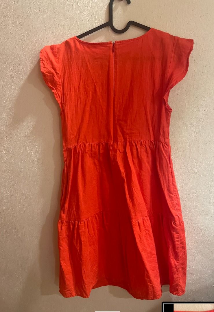 Red/Orange Tiered Mini Dress with Flutter Sleeves (Category: Dresses) located in Quezon City. Submitted by kiarampang60581 (Listing ID 1461731516, Image 1). Description: - Features charming flutter sleeves - Stylish tiered skirt design - Convenient back zipper closure - Light, breathable, and comfortable fabric - Size XS Feel free to message me for more details about the item! Loc: Culiat, Quezon City, Metro Manila MOP: GCash / BDO MOD: J&T / Gra
