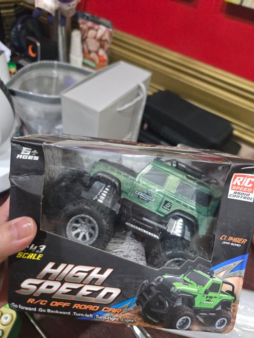 remote controlled car (Category: Remote Control Toys) located in Quezon City. Submitted by mello_letgoes (Listing ID 1461724925, Image 1). Description: High Speed R/C Off Road Car – 1:43 Scale | Green High Speed remote-controlled off-road car in green. • 1:43 scale • Off-road / 4x4 style design • Remote controlled • Forward and backward movement • Turn left and right • With light function • Green color • Comes with original box • Actual item show
