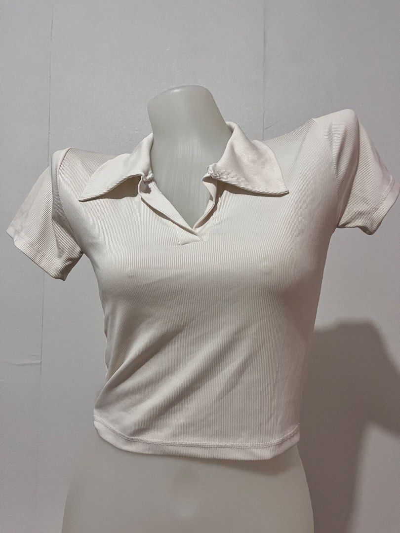 Ribbed Polo Collar Crop Top (Category: Blouses) located in Manila. Submitted by chimcheese (Listing ID 1461583311, Image 1). Description: - Cream ribbed crop top - Features a polo collar - Short sleeves - Very stretchy material - Pairs well with high-waisted jeans or skirts - Easy to style for casual or dressed-up occasions.