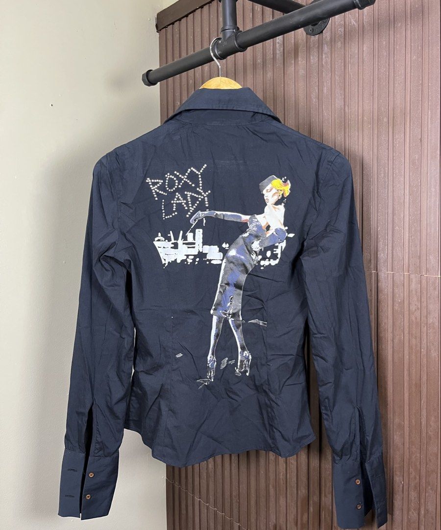 Richmond ‘X’ Y2K Roxy Lady Button Down Long Sleeve (Category: Others Tops) located in Cabanatuan. Submitted by cabsygoods (Listing ID 1461718503, Image 1). Description: Richmond ‘X’ Roxy Lady Button Down Long Sleeve Width 17 Length 24 Very good condition No issue Color rate 9/10 Dm to purchase! 📩.