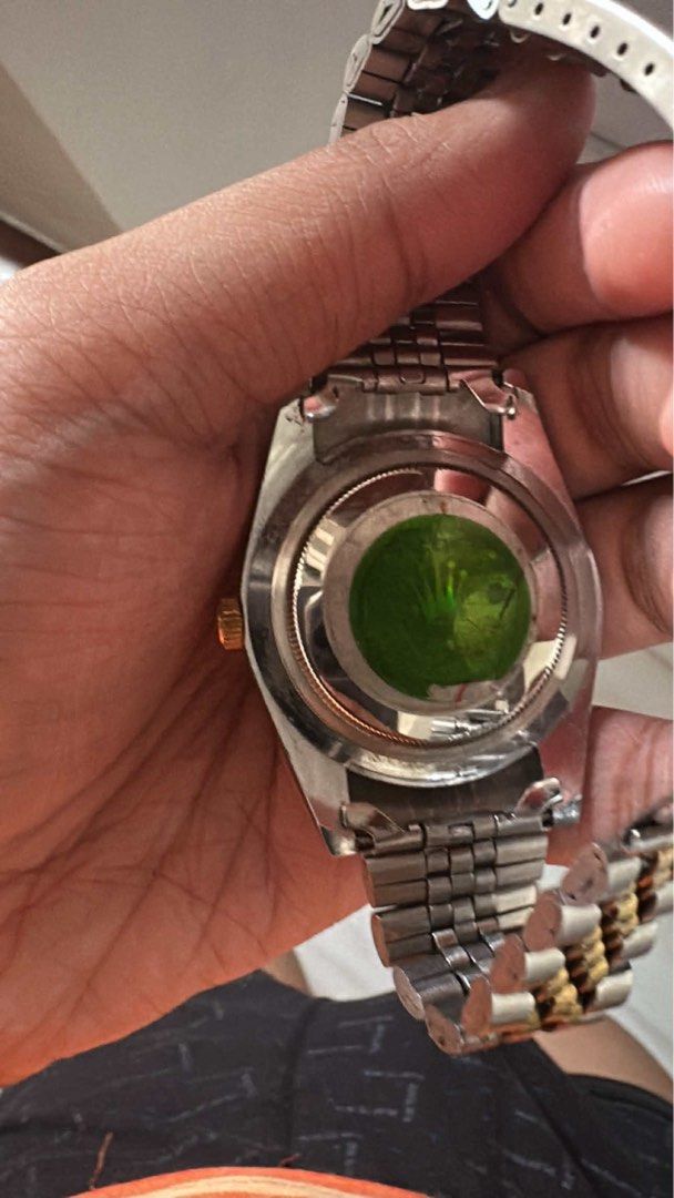 ROLEX Datejust-style watch. (Category: Luxury Watches) located in Bacoor. Submitted by ricric0918 (Listing ID 1461606021, Image 1). Description: RUSH SALE FOR 5K BADLY NEED MONEY Two-Tone Datejust-Style Watch — For Sale Elegant Two-Tone Watch Classic silver & gold-tone design Fluted-style bezel Champagne/gold-tone dial Date display with magnified lens Jubilee-style bracelet Dressy/classic look, suitable for everyday wear or occasions Pre-owned co