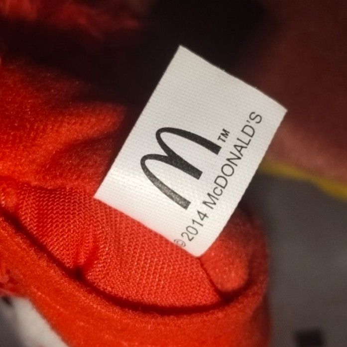 RONALD McDonald's Plush Charms (Category: Plushies & Soft Toys) located in Mabalacat. Submitted by whowannashoppe (Listing ID 1461771145, Image 2). Description: RONALD MCDONALD'S PLUSH CHARMS P200. 00 each + SF - Authentic McDonalds collectibles - Official McDonald's merchandise (2014) - Features the iconic clown face with a red smile - Soft, fluffy red hair detail - Perfect for collecting, decorating bags, or keychains - Adds a touch of nostalgi