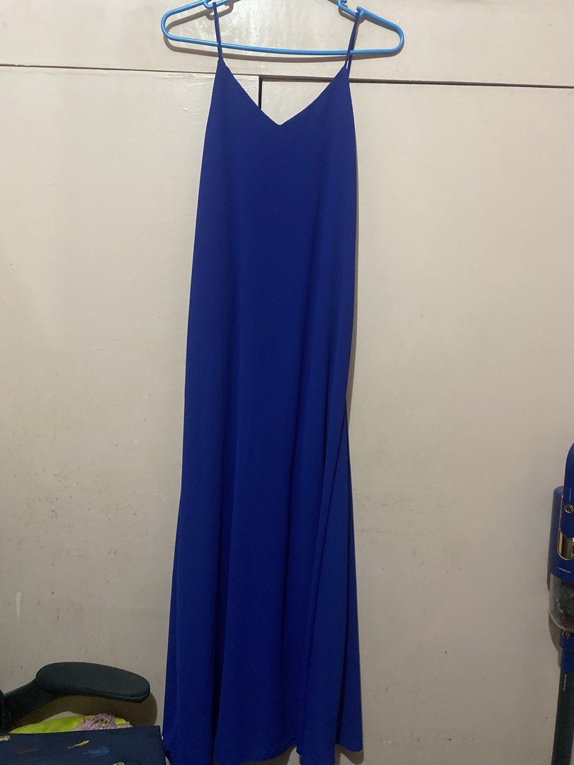 Royal Blue Spaghetti Strap Maxi Dress (Category: Dresses) located in Manila. Submitted by angelaay143 (Listing ID 1461774176, Image 1). Description: - Flowy royal blue maxi dress - Never used - V-neckline with spaghetti straps - Drapes beautifully - Simple and chic design - Fits most sizes (freesize) - With lining -Needs laundry stored too long at the cabinet.
