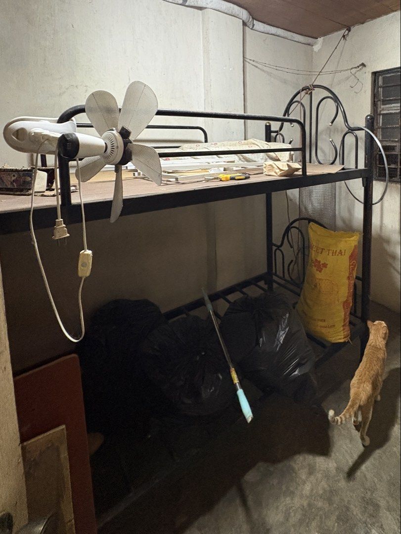 RUSH SALE! Metal Bunk Bed Frame (Category: Bed Frames & Mattresses) located in Manila. Submitted by _claireee_ (Listing ID 1461716541, Image 1). Description: - Black metal bed frame - Nasira na yung ladder so selling for a lower price - Very sturdy moving out kaya need ibenta - Sold as is (cat not included!) - Price is negotiable.