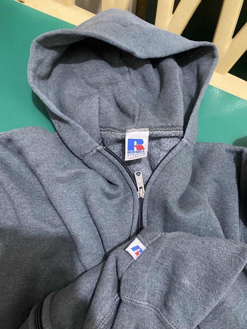 Russell Athletic Grey Zip Up Hoodie (Category: Hoodies) located in Quezon City. Submitted by rockyroadzz (Listing ID 1461601320, Image 2). Description: - Grey Russell Athletic zip-up hoodie - Classic design with front pockets - Soft and comfortable material - Perfect for everyday wear - 25x23 - Boxy fit.