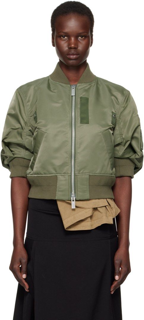Sacai 22SS Nylon Twill Cropped Puff Bomber Jacket (Category: Luxury Apparel) located in Manila. Submitted by streetsavvy (Listing ID 1461679400, Image 3). Description: Sacai 22SS Nylon Twill Cropped Puff Bomber Jacket Size: 1 Width: 20” Length: 20” Shoulder: 17” Sleeve Length: 14” Hem: 15” Measured in Inches iconic piece from Sacai’s Spring/Summer 2022 collection. This piece features Chitose Abe’s signature hybrid design, combining classic MA-1 m