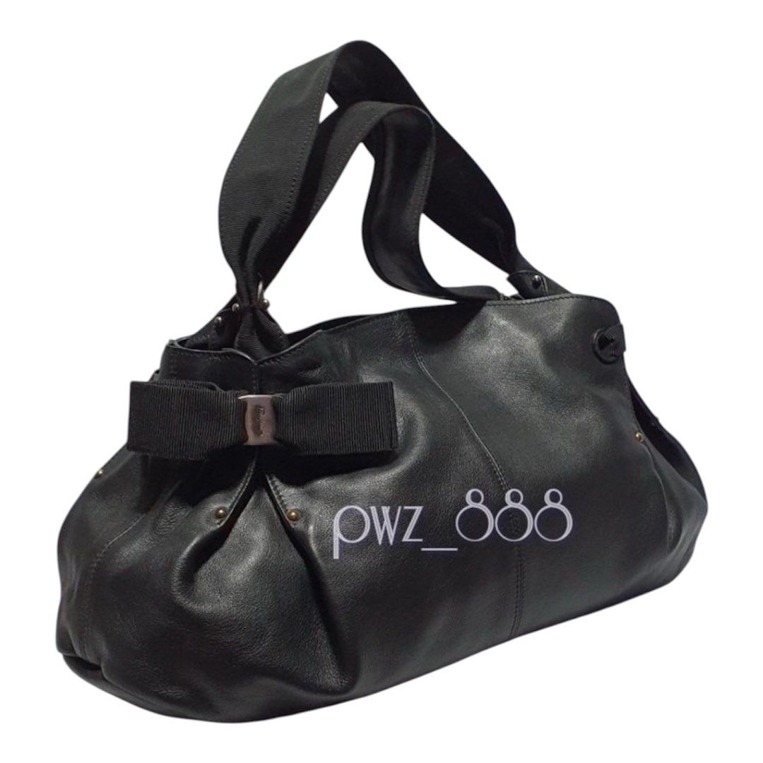 Salvatore Ferragamo Bara Bow Bag (Category: Tote Bags) located in Baguio. Submitted by pwz-eshop (Listing ID 1461633055, Image 1). Description: • Please make reading a habit! • I do not reserve items. I only mark items as reserved when it is paid. Paid items are shipped the next day. No shipping on holidays. • I do not have when worn pictures, please rely on actual dimensions for sizing. • Up for Grabs!! • Guaranteed Authentic!! • Flaws: Minor ru