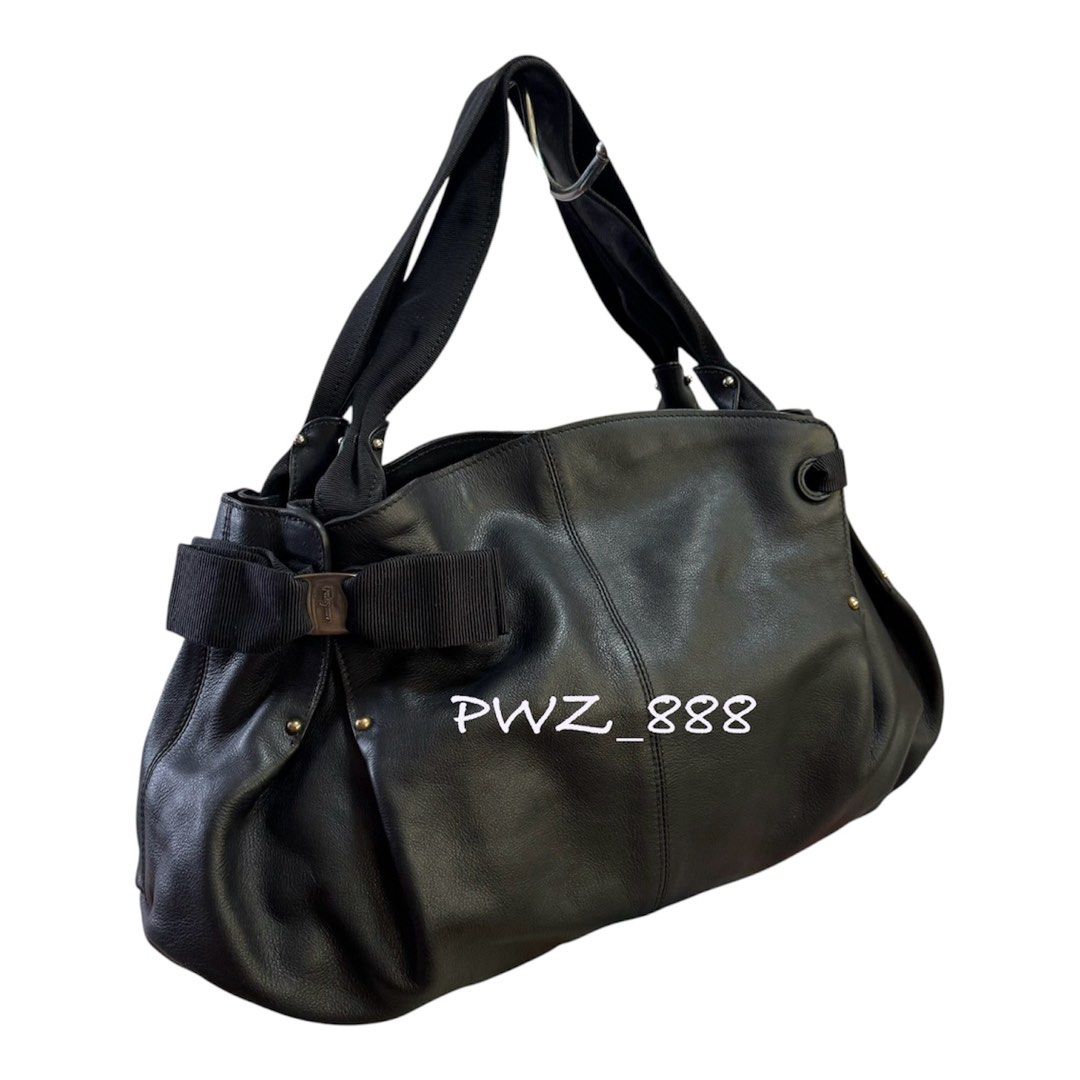 Salvatore Ferragamo Bara Bow Bag (Category: Tote Bags) located in Baguio. Submitted by pwz-eshop (Listing ID 1461633055, Image 2). Description: • Please make reading a habit! • I do not reserve items. I only mark items as reserved when it is paid. Paid items are shipped the next day. No shipping on holidays. • I do not have when worn pictures, please rely on actual dimensions for sizing. • Up for Grabs!! • Guaranteed Authentic!! • Flaws: Minor ru