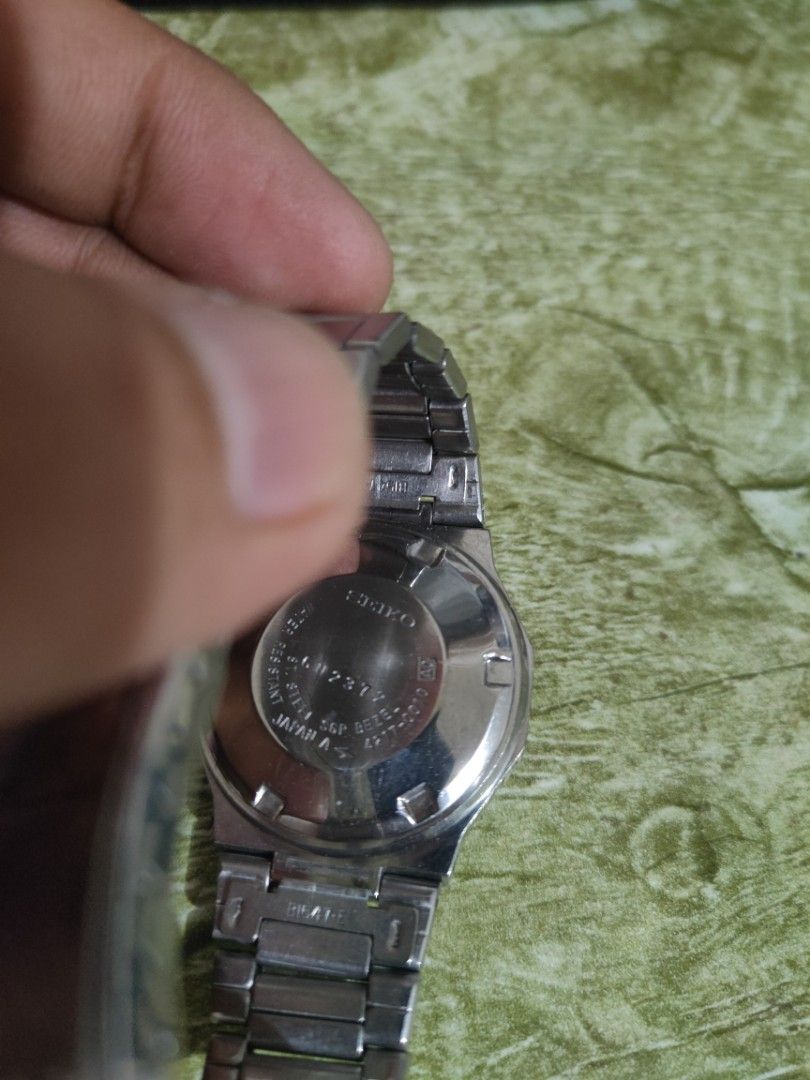 Seiko 5 Automatic Watch - Grey Checkerboard Dial (Category: Men's Watches) located in Cebu City. Submitted by goodsnagoodspa (Listing ID 1461696767, Image 3). Description: - Vintage Seiko 5 Automatic Watch - Cool Grey Checkerboard Dial with Gold Accents - Day and Date Complication - Stainless Steel Bracelet - Automatic Movement, 23 Jewels - Signs of wear consistent with age (case & bracelet) - Classic timepiece for watch enthusiasts.