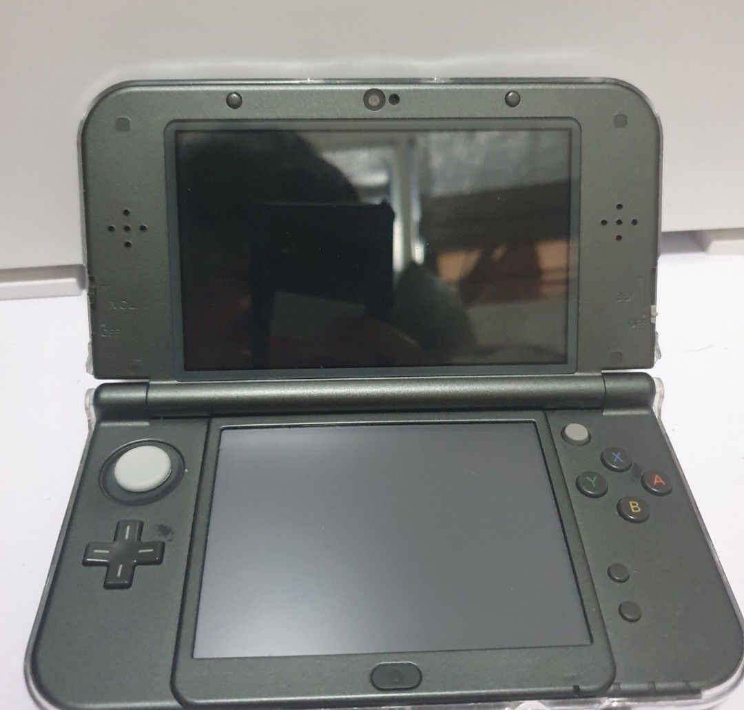Selling IPS New 3DS XL Videogame console (Category: Nintendo) located in Quezon City. Submitted by itemsforadoption (Listing ID 1461625295, Image 2). Description: Important note: carousel sellers have limited replies. If I can't reply, feel free to message me on 09338548592 Rfs: Its 2026! Happy New Year! Hoping you have a good year ahead of you! If you have questions feel free to send a message. Though I'll most likely be able to reply from 10am 