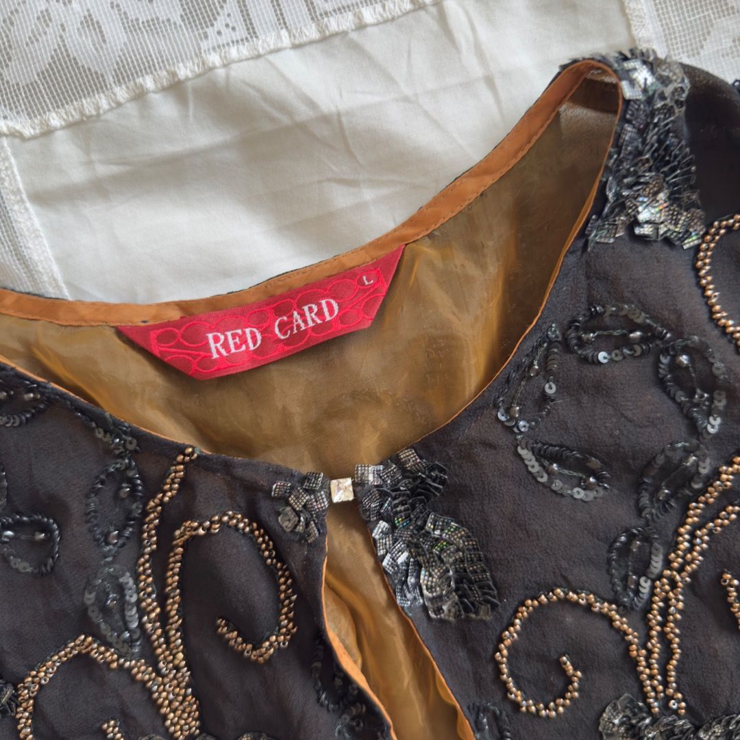 Sequin Bolero (Category: Blouses) located in Cebu City. Submitted by marikit_thrift (Listing ID 1461688038, Image 3). Description: Sequin Bolero -beads in tact -has clasp infront -L on tag -b-30, L-14.