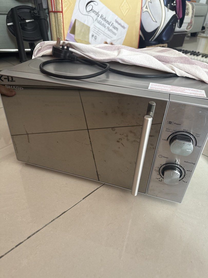 Sharp Microwave Oven (Category: Ovens & Toasters) located in Shah Alam. Submitted by jayson_cha (Listing ID 1461620008, Image 1). Description: - Sharp Microwave Oven - Features: Power, Timer, Defrost - Power Levels: Low, Med Low, Med, Med High, High - Defrost Settings: Adjustable by kg - Ideal for everyday kitchen use -can negotiate.