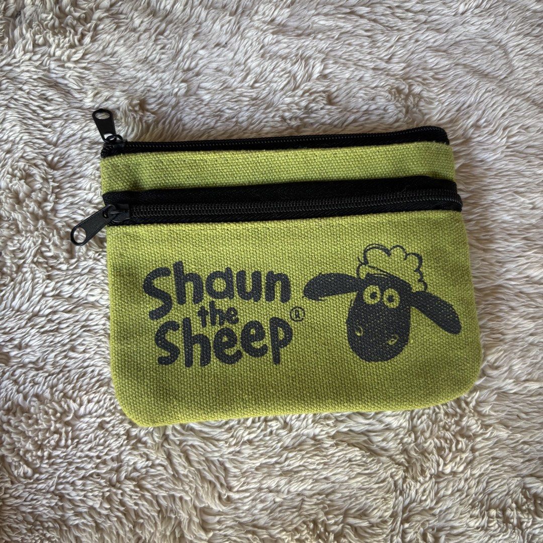 Shaun sheep Canvas wallet (Category: Wallets & Card holders) located in Tarlac. Submitted by alta.mayo (Listing ID 1461772511, Image 1). Description: • 5 x 4 inches • Japan anik-anik Guaranteed 💯% Authentic ❎ No Reservation 📌 Mop: Gcash 📌 Courier: JNT 📌 Location: Tarlac.