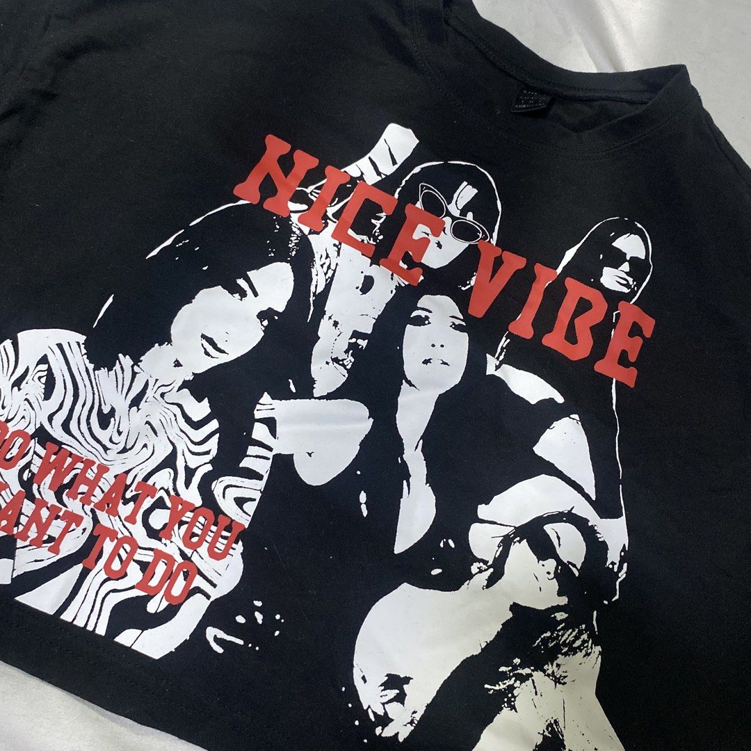 SHEIN Black Graphic Crop Top "Nice Vibe" (Category: Shirts) located in Rizal. Submitted by lili.s.choyce (Listing ID 1461722830, Image 2). Description: - Black crop top - Features 'Nice Vibe' graphic print with women and text - Short sleeves - Relaxed fit - Ideal for casual and trendy outfits.