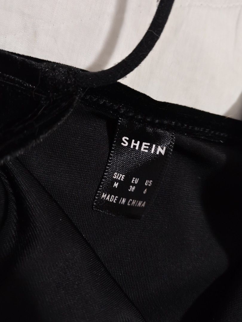 SHEIN Black Velvet Cami Crop Top (Category: Sleeveless) located in Antipolo. Submitted by _suspiria (Listing ID 1461668208, Image 2). Description: - Black velvet cami crop top from SHEIN - Medium on tag - Bust: 14in when laid flat - Features spaghetti straps and a V-neckline .