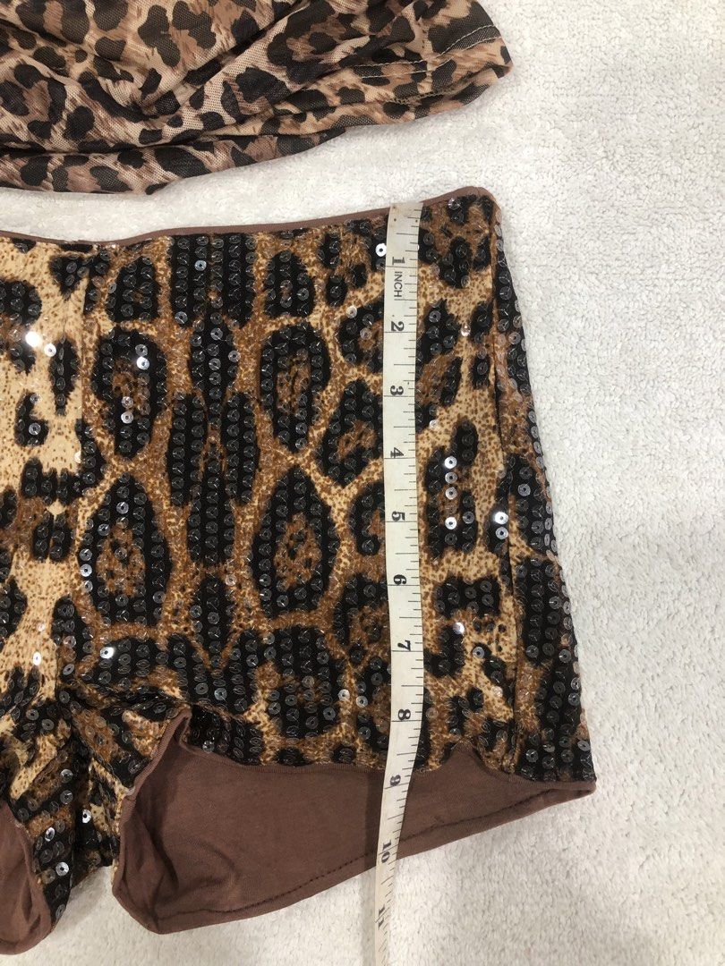 SHEIN Leopard Print Tube Top & Sequin Shorts Set (Category: Sets or Coordinates) located in Manila. Submitted by janmichael26601 (Listing ID 1461615478, Image 3). Description: - SHEIN leopard print tube top with ruched detailing. - Matching shorts are fully sequined with a brown lining. - Ideal for a night out or a costume party. - Measurements are provided in the product photos..