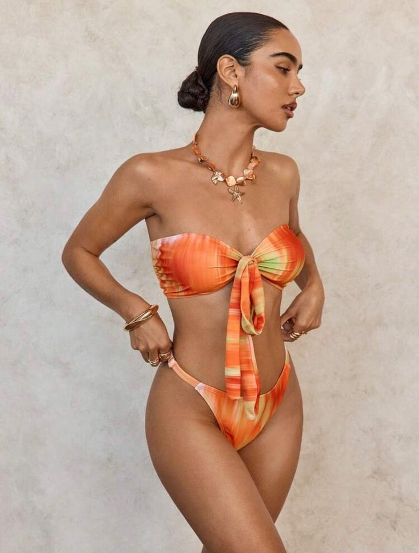 Shein Orange Bikini Set (Category: Bikinis & Swimsuits) located in Taguig. Submitted by ishaintsad (Listing ID 1461618584, Image 2). Description: - brand new - no ww pic - small on tag - ₱500 plus orig price.