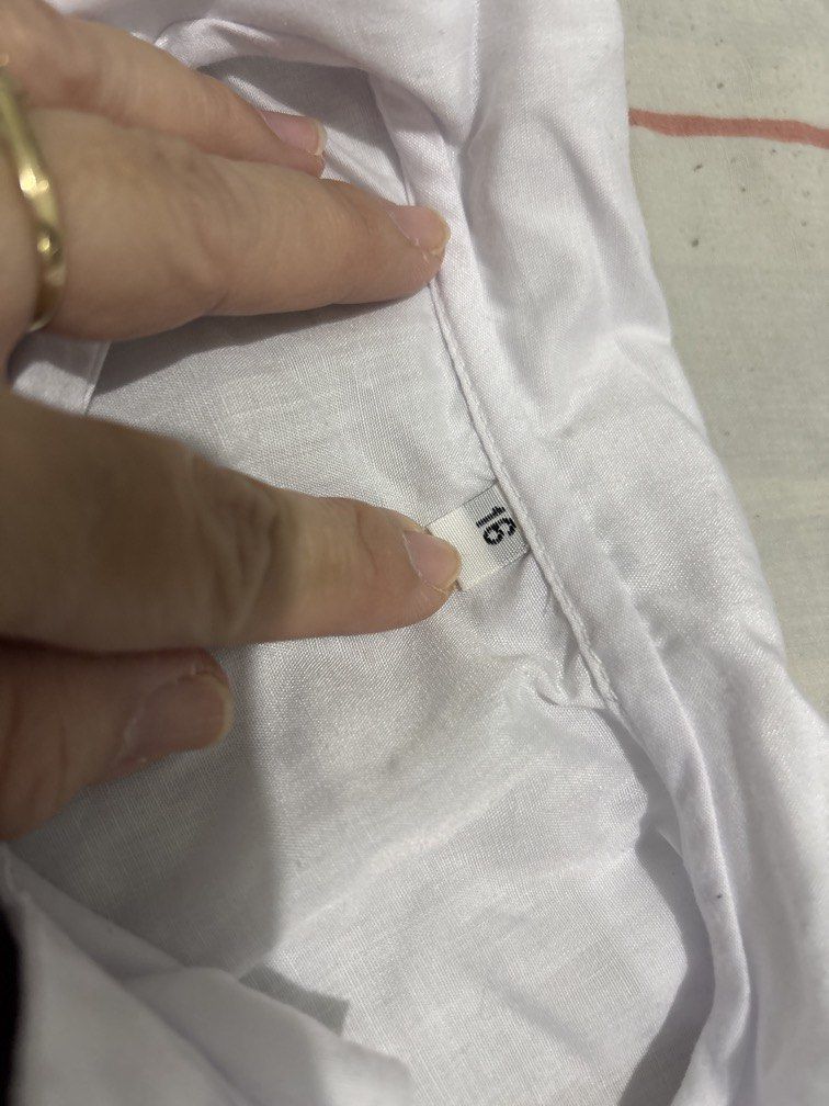 Size 16 white polo top uniform (Category: Babies & Kids Fashion) located in Manila. Submitted by vintageaccessories (Listing ID 1461727822, Image 2). Description: .