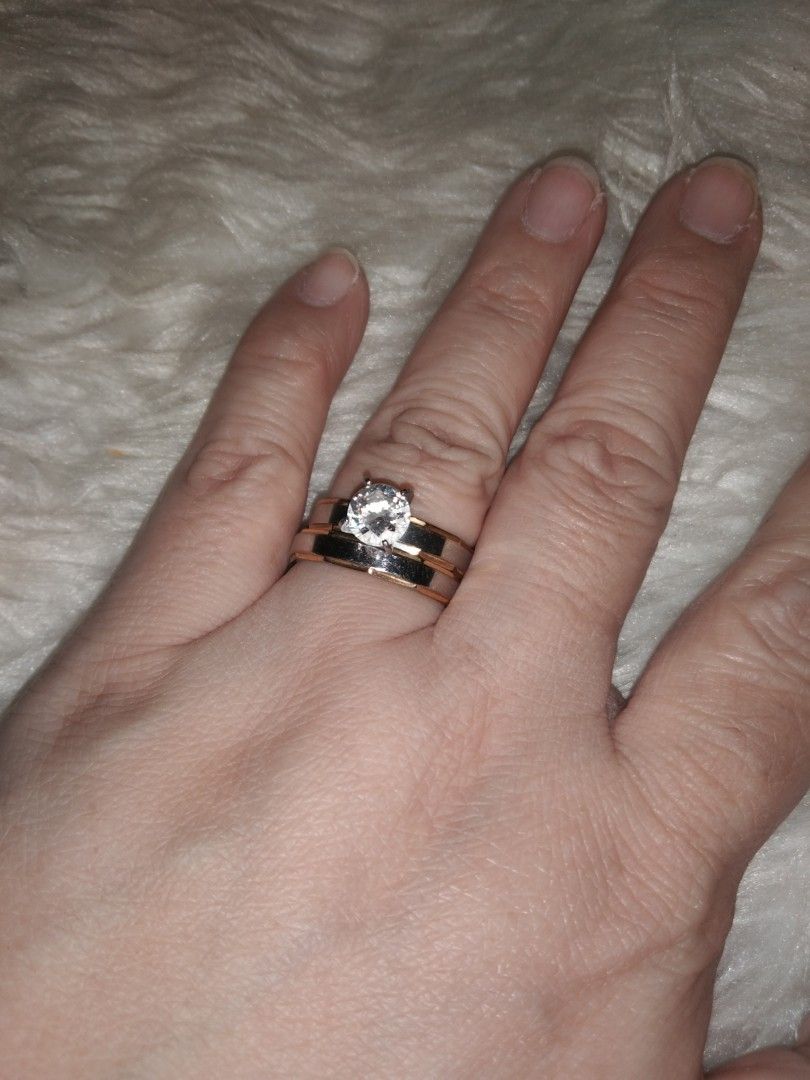 Size 8 engagement ring with stones 2pc rings (Category: Rings) located in Quezon City. Submitted by eidorableshop (Listing ID 1461574493, Image 1). Description: non tarnish .