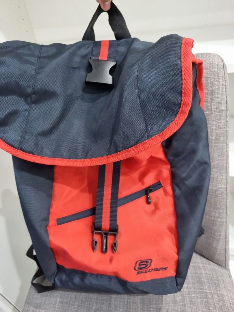 Skechers Backpack Red and Navy Blue (Category: Backpacks) located in Calamba. Submitted by declutterrrrph (Listing ID 1461655781, Image 3). Description: Top flap closure with a buckle Can fit 14-inch laptops Condition: 8.5/10 Color rate: 10/10 Meetup Calamba Area or ship thru LBC/J&T 09153754810.