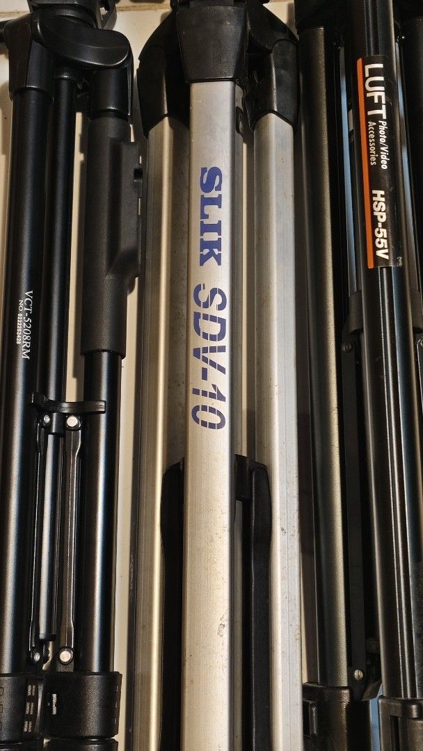 Slik, Luft, VCT Tripods - Bundle Deal (Category: Tripods & Monopods) located in Bulacan. Submitted by babz30261 (Listing ID 1461656298, Image 2). Description: - Bundle of 3 tripods: Slik SDV-10, Luft HSP-55V, and VCT-528RM. - All tripods are functional and ready for immediate use. - Perfect for both photography and videography needs. - Great value when purchased as a set..