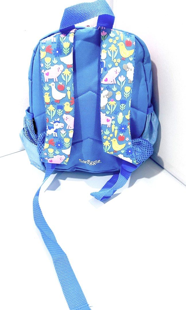 Smiggle Teeny Tiny Backpack - Farm Animals Print (Category: Babies & Kids Fashion) located in Antipolo. Submitted by shopaho_nique (Listing ID 1460239976, Image 2). Description: - Authentic Adorable Smiggle backpack for little ones - Fun farm animal print (pigs, ducks, cows, chickens) - Blue with pink trim and a sparkly front pocket - Adjustable straps for a comfortable fit - Convenient mesh side pocket - Ideal size for toddlers and preschoolers 