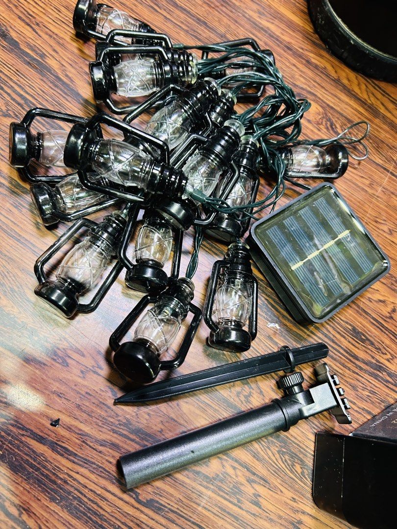 Solar Powered Lantern String Lights for Outdoor Decor (Category: Lighting) located in Manila. Submitted by starbalesukandjapansurplus (Listing ID 1461624054, Image 3). Description: - Solar-powered string lights with charming mini lantern bulbs. - Ideal for decorating patios, gardens, and outdoor spaces. - Charges automatically during the day and illuminates at night. - Easy installation with the included ground stake. - Creates a warm and cozy at