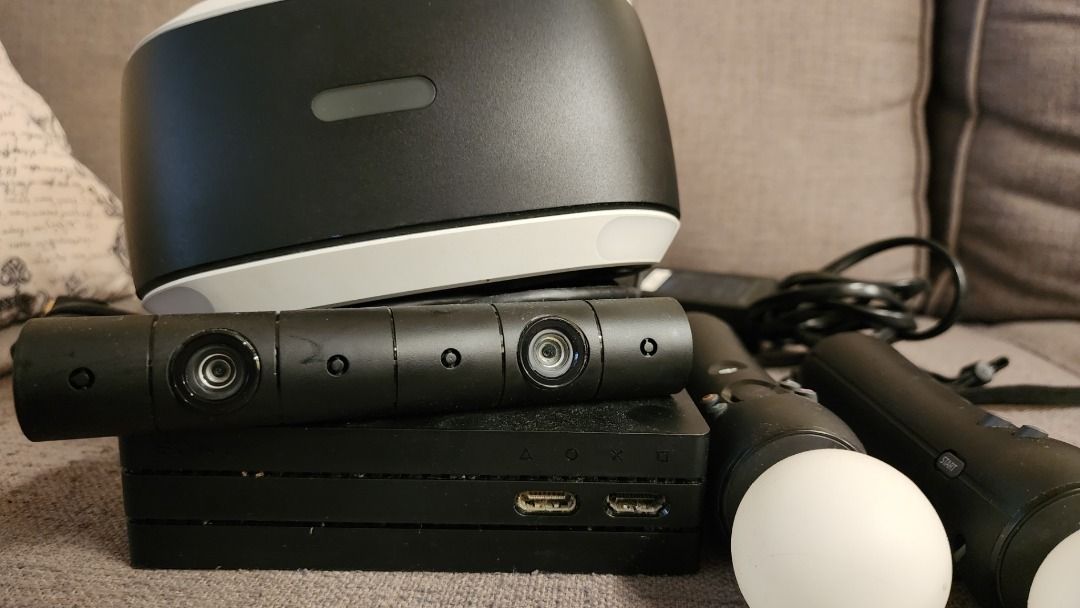 Sony PlayStation VR Bundle with Controllers and Camera (Category: PlayStation) located in Quezon City. Submitted by berniiie1 (Listing ID 1461654357, Image 3). Description: RUSH AND NEGOTIABLE Selling my Sony PlayStation VR 1, rarely used and just sitting in storage since I got a PS5. Inclusions: - PSVR unit - Processor Unit - PS Camera - 2x Move Controllers - Complete HDMI / USB / Power cables - I can include the PS4 Headset, but the ear muffs h
