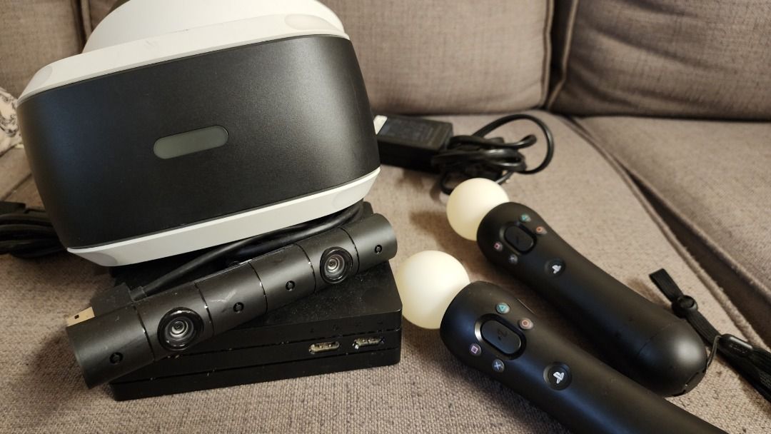 Sony PlayStation VR Bundle with Controllers and Camera (Category: PlayStation) located in Quezon City. Submitted by berniiie1 (Listing ID 1461654357, Image 1). Description: RUSH AND NEGOTIABLE Selling my Sony PlayStation VR 1, rarely used and just sitting in storage since I got a PS5. Inclusions: - PSVR unit - Processor Unit - PS Camera - 2x Move Controllers - Complete HDMI / USB / Power cables - I can include the PS4 Headset, but the ear muffs h